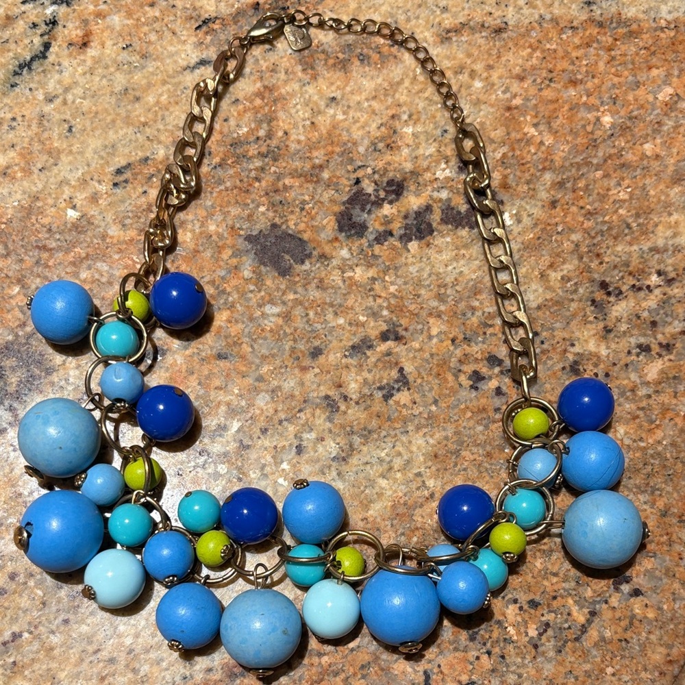 Blue beaded marked necklace..
